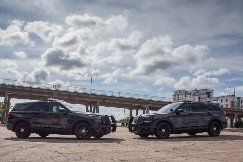 Patrol cars facing each other in the day.jpeg