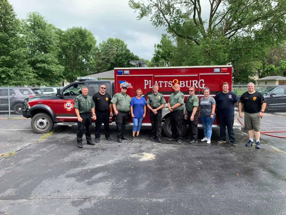 Public Safety Members in front of fire truck