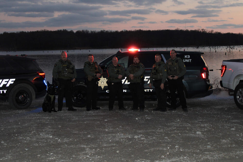 Clinton County Road Patrol Deputies in Front of vheicles